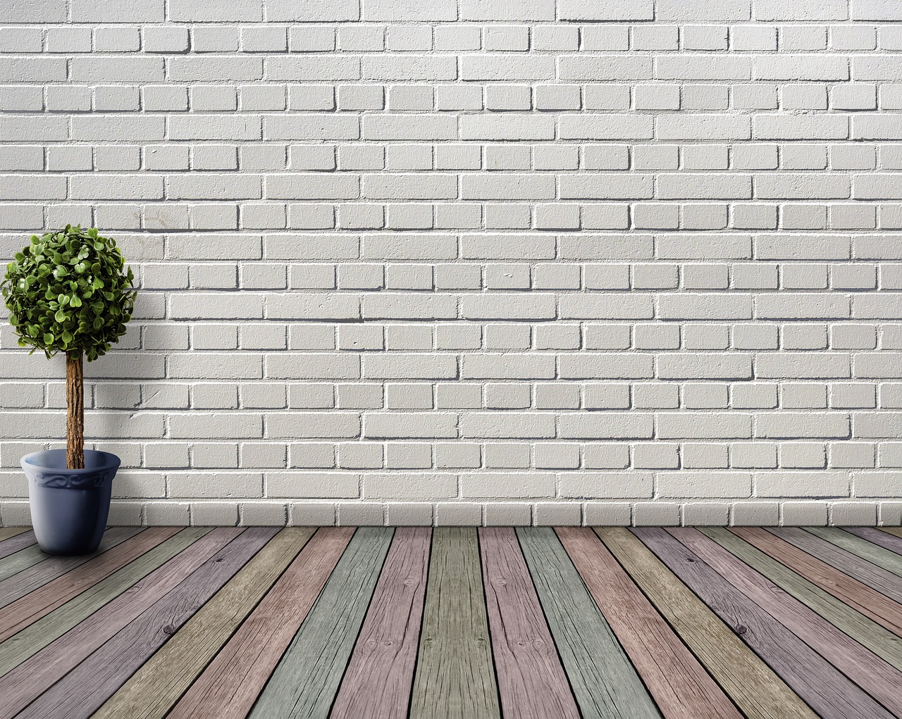 Greige muurverf met houten vloer en planten. Greige muurverf met houten vloer en planten.